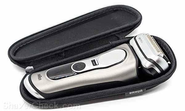 The shaver inside the travel case.