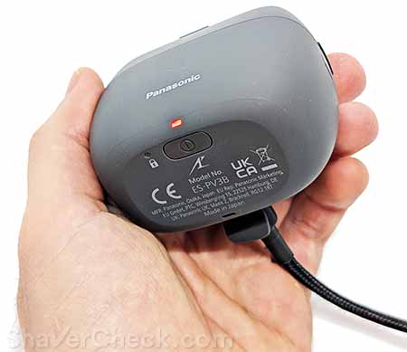 Charging the Panasonic Palm 5-blade shaver.