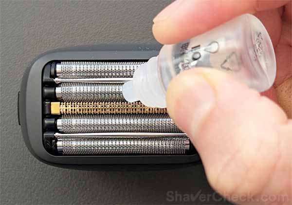 Oiling the blades of the Panasonic Palm.