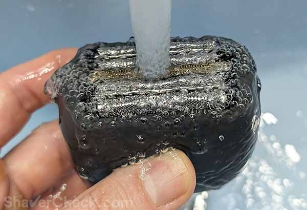 Rinsing off the soap.