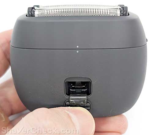 The charge flap on the Panasonic Palm ES-PV3B-K.
