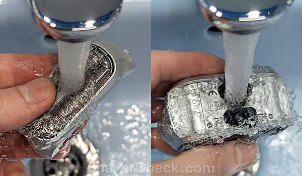 Washing the shaver with water.