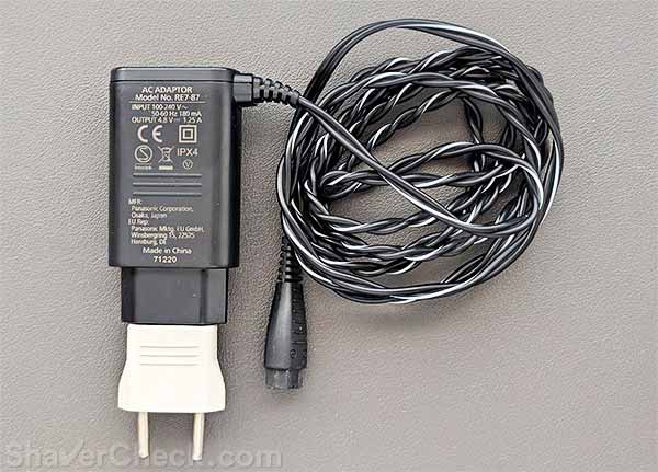 Panasonic RE7-87 charger with an EU plug adapter.